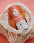 Mateina can in a mesh bag with oranges