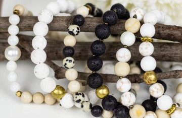 Mala bracelets on sticks