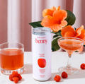 Energy reimagined Benny can with hibiscus flowers and cocktail glasses
